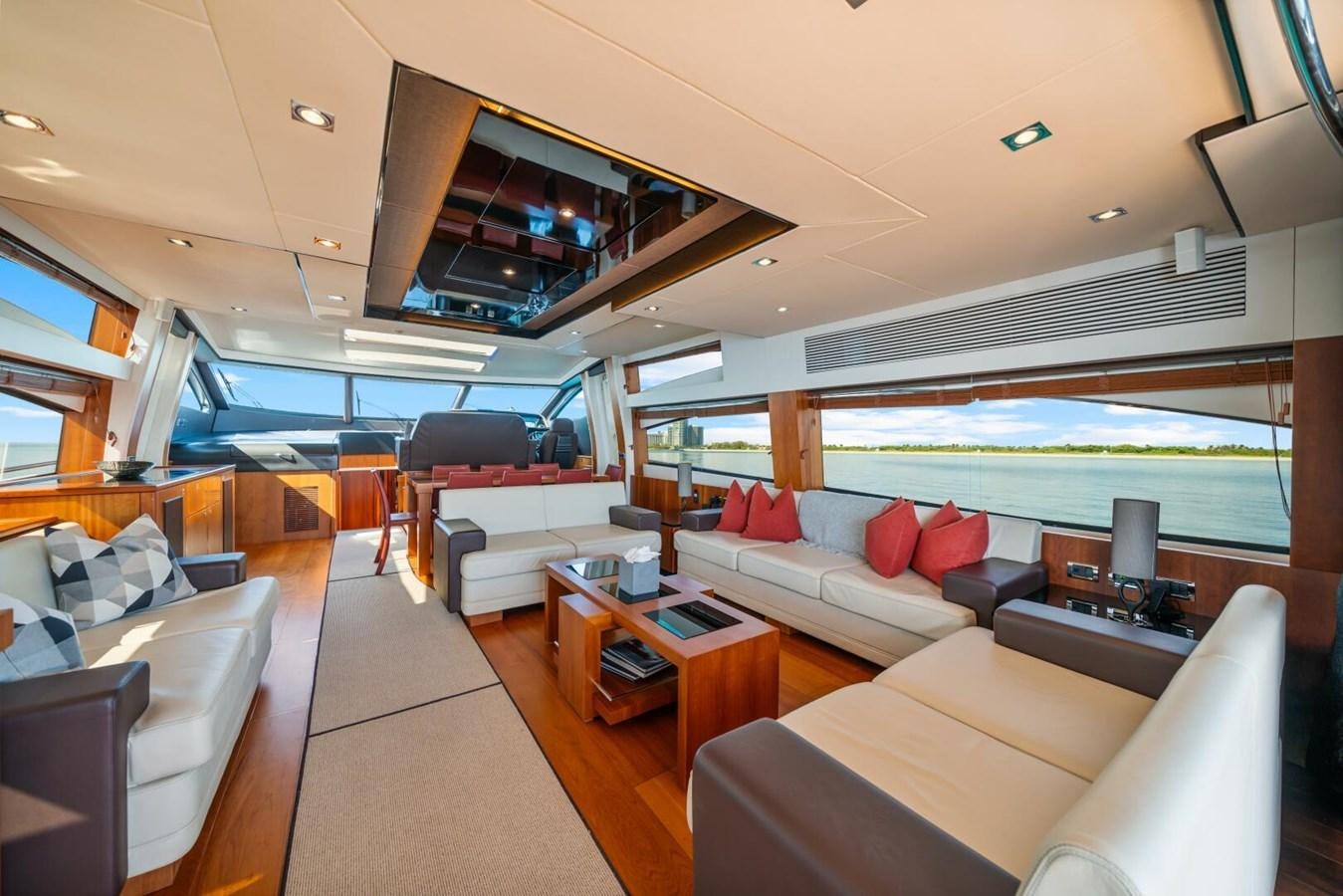 a living room with a large boat aboard PREDATOR 84 Yacht for Sale
