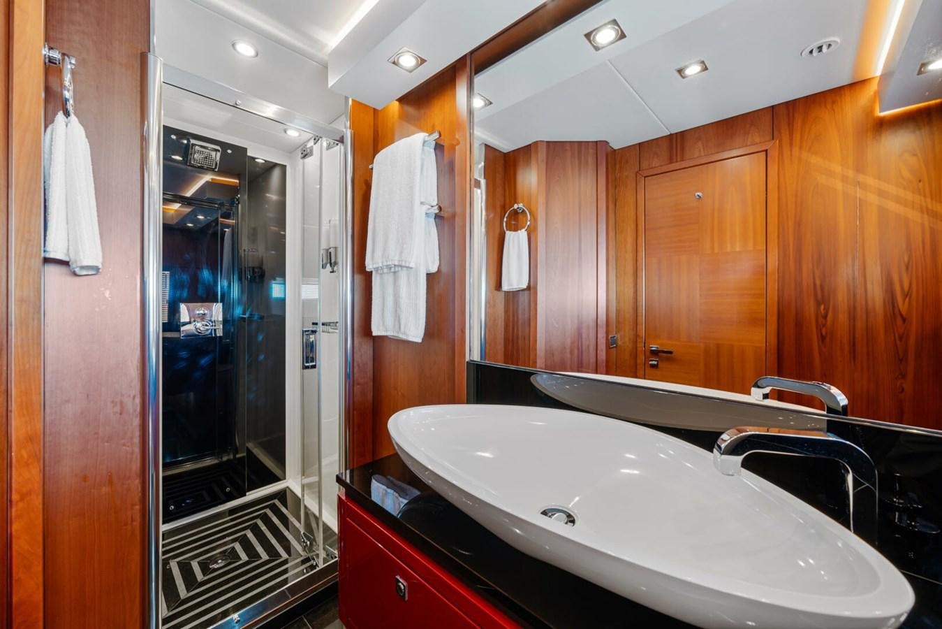 a bathroom with a large sink aboard PREDATOR 84 Yacht for Sale