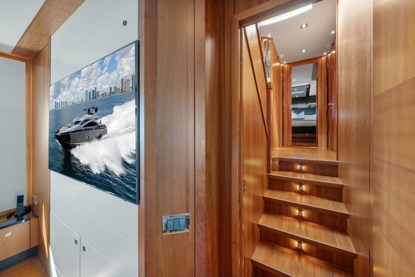 a wood door with a mirror aboard PREDATOR 84 Yacht for Sale
