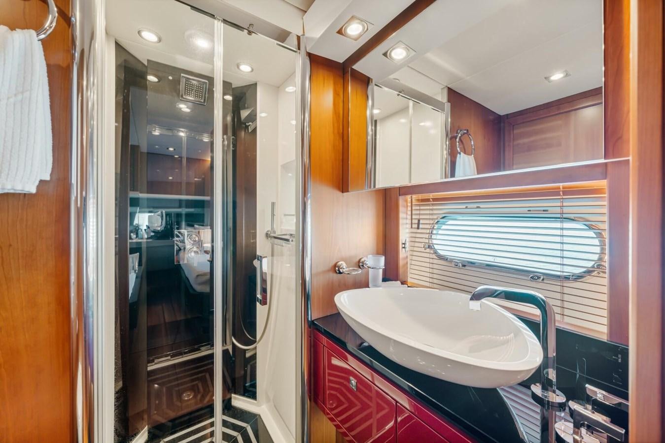 a bathroom with a sink and a shower aboard PREDATOR 84 Yacht for Sale