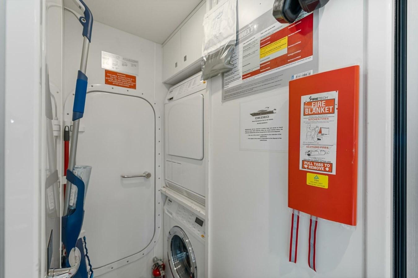 a white wall with signs on it aboard PREDATOR 84 Yacht for Sale