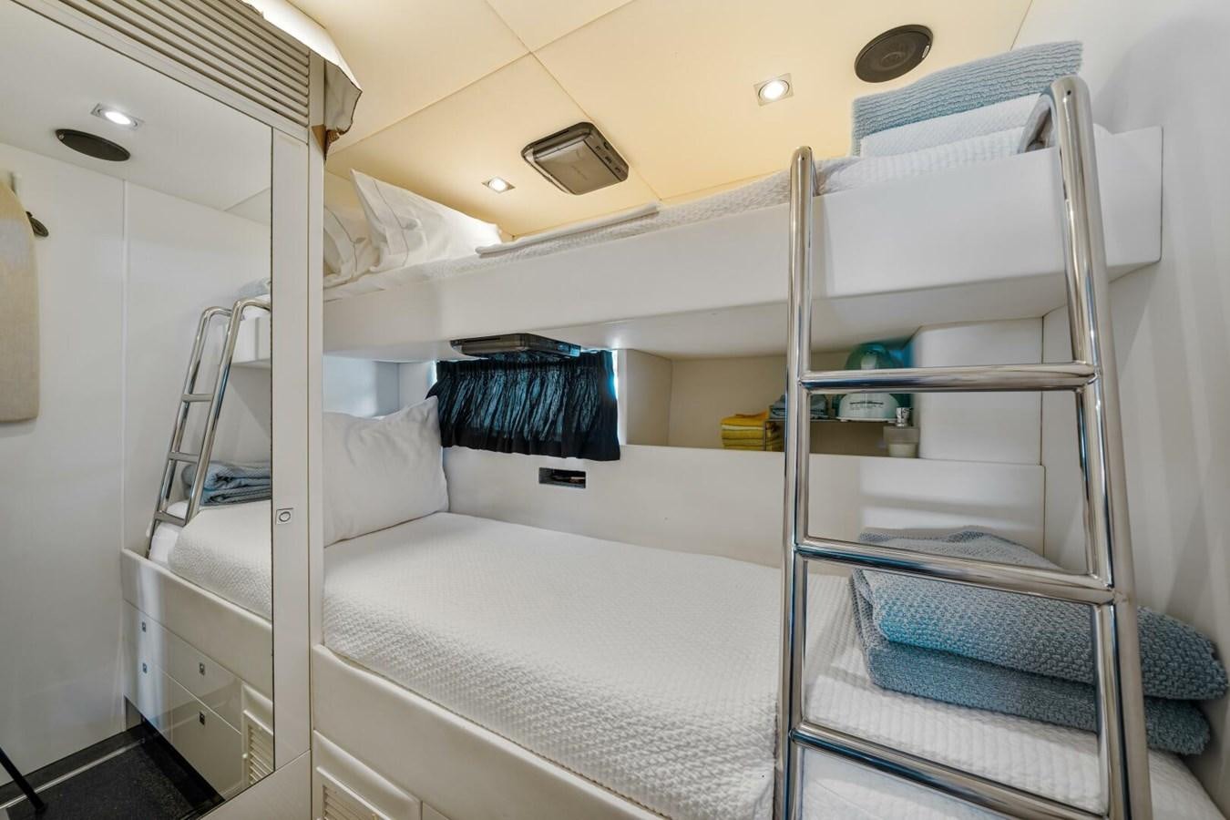 bunk beds in a room aboard PREDATOR 84 Yacht for Sale
