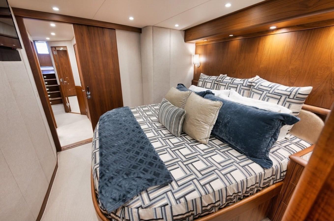 a bed in a room aboard ARTEMIS Yacht for Sale