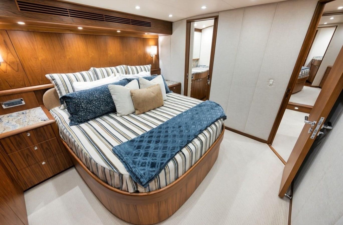 a bed in a room aboard ARTEMIS Yacht for Sale