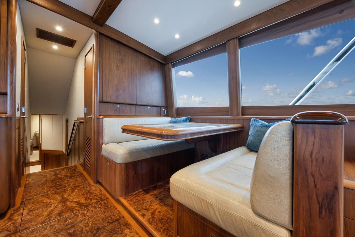 a room with a couch and a table aboard ARTEMIS Yacht for Sale