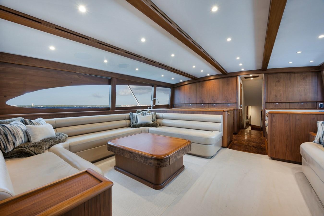 a room with a bed and a large mirror aboard ARTEMIS Yacht for Sale