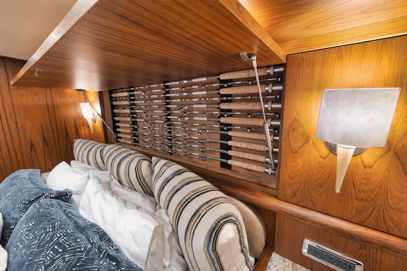 a bed in a wooden room aboard ARTEMIS Yacht for Sale