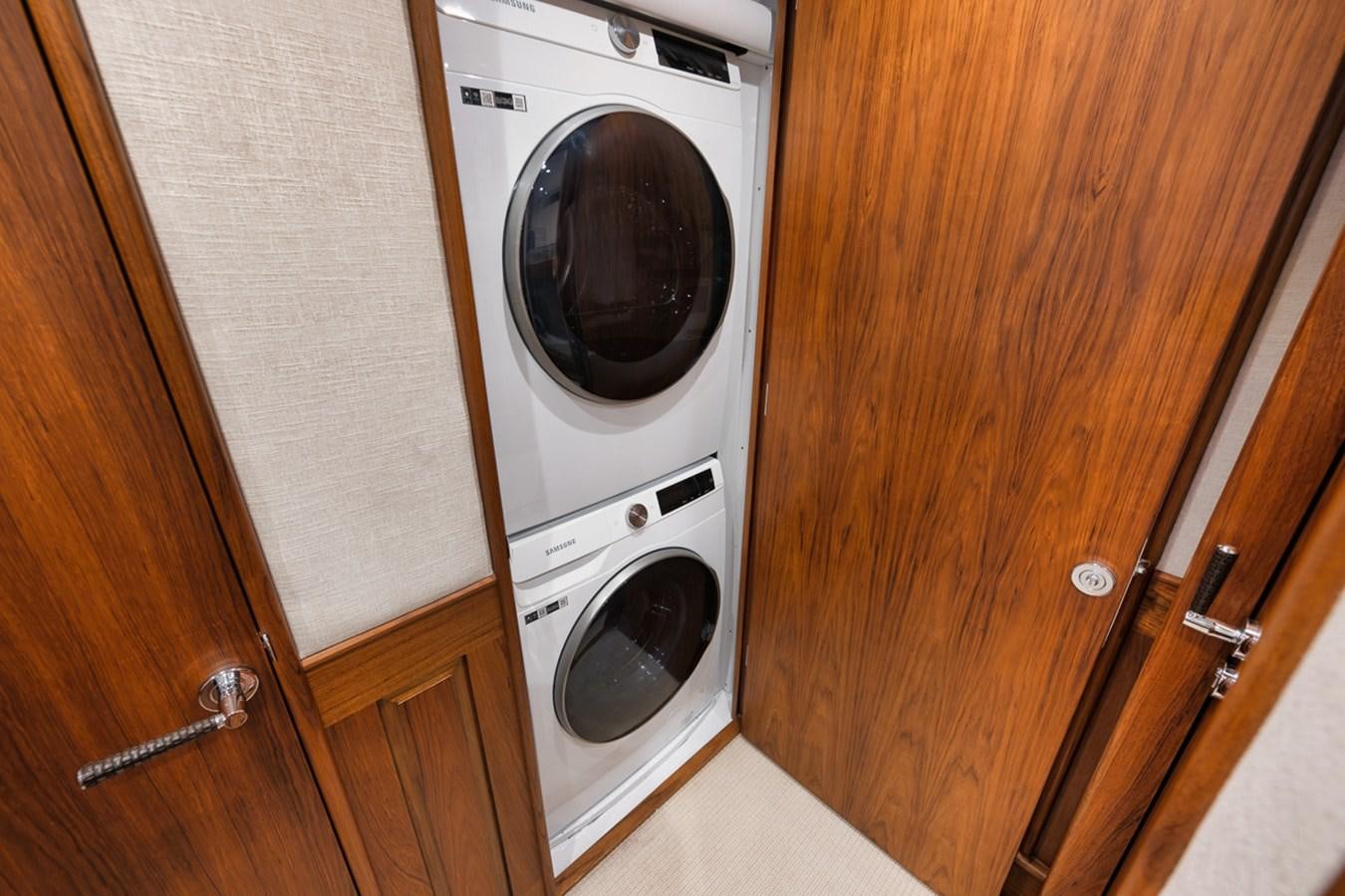 a washer and dryer in a room aboard ARTEMIS Yacht for Sale