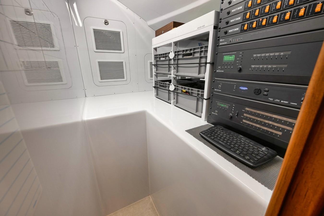 a computer on a table aboard ARTEMIS Yacht for Sale