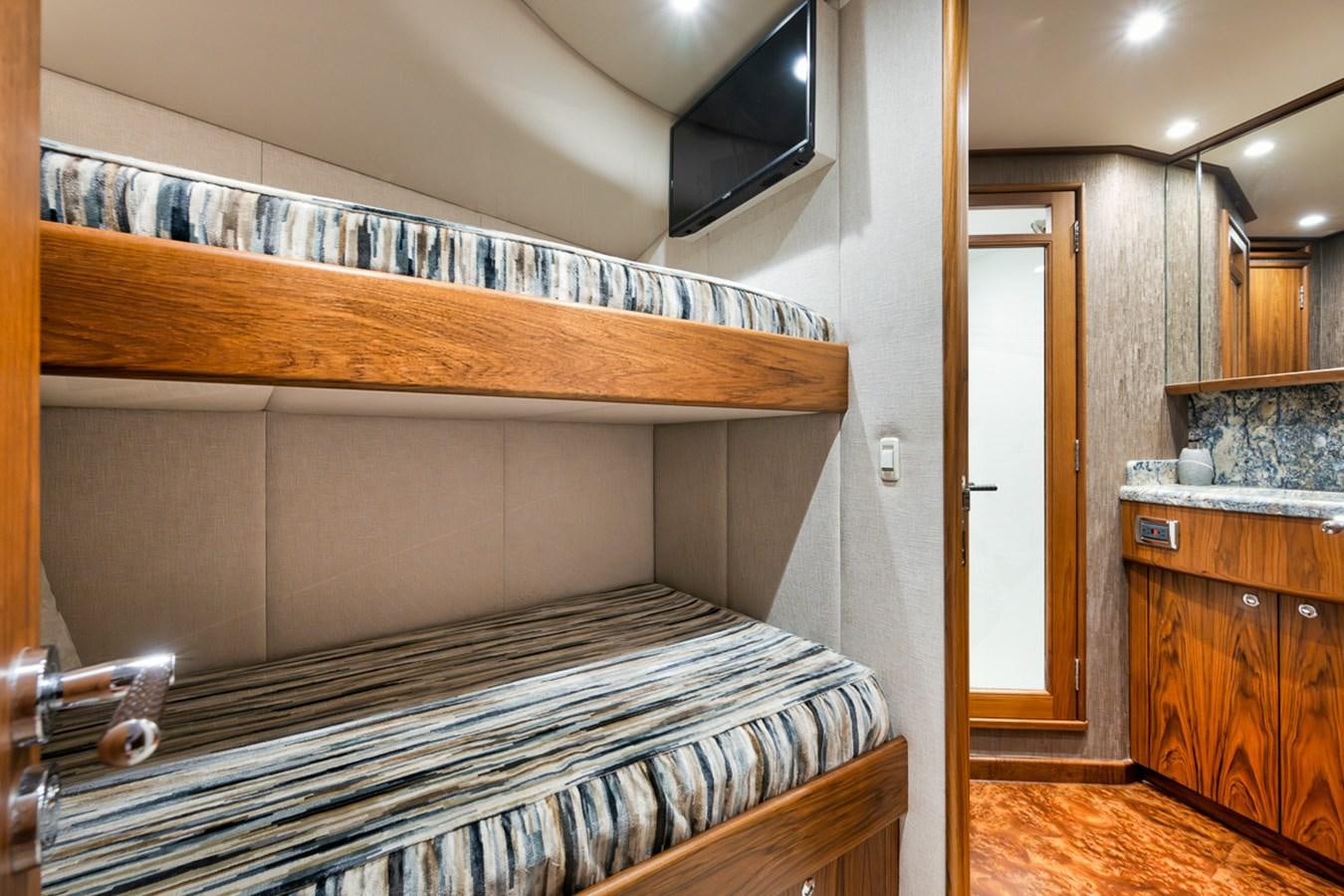 a bed in a room aboard ARTEMIS Yacht for Sale