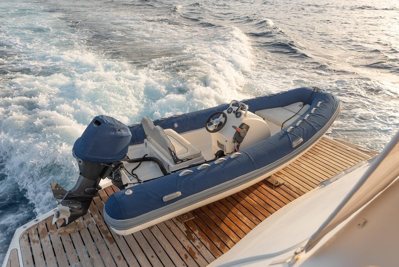 a boat on the water aboard ROUND MIDNIGHT Yacht for Sale