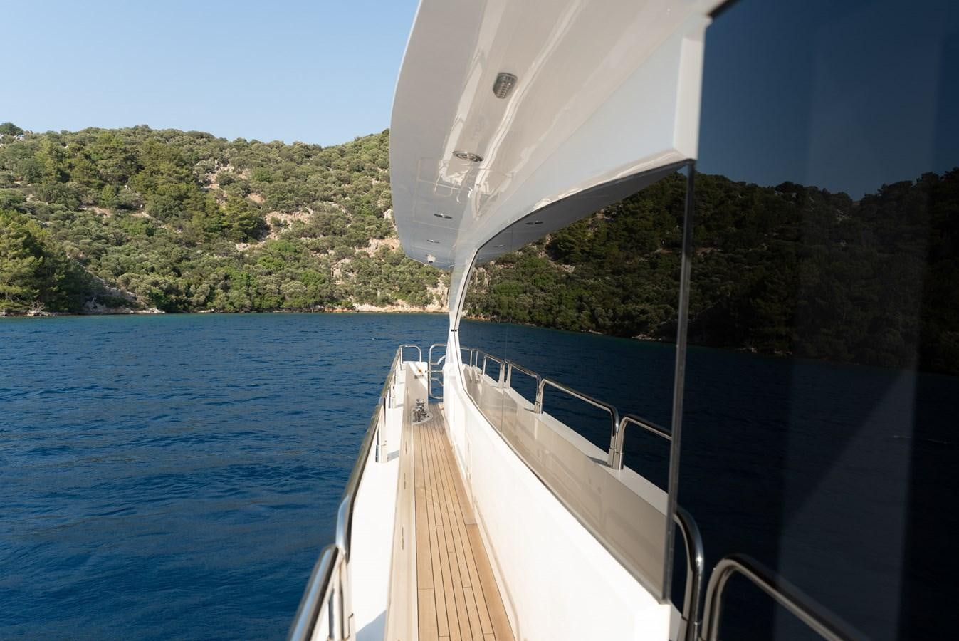 a boat on the water aboard ROUND MIDNIGHT Yacht for Sale