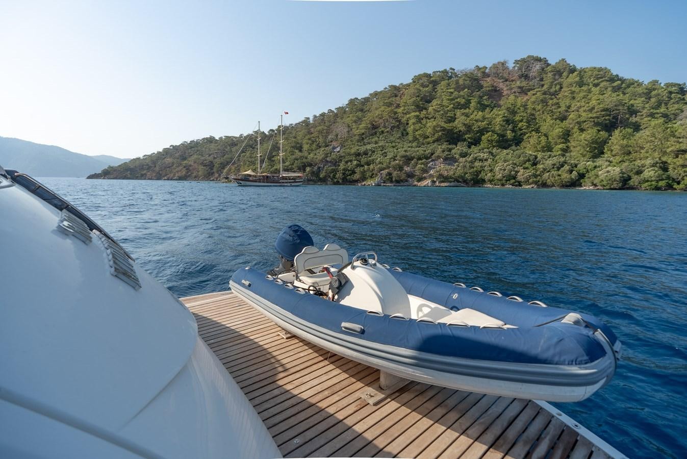 a boat on the water aboard ROUND MIDNIGHT Yacht for Sale