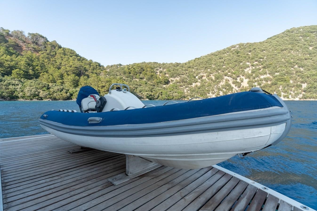 a boat on the water aboard ROUND MIDNIGHT Yacht for Sale