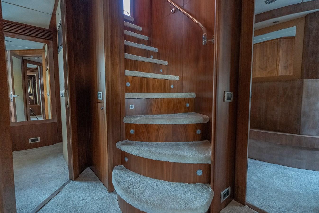 a set of stairs leading to a room aboard ROUND MIDNIGHT Yacht for Sale