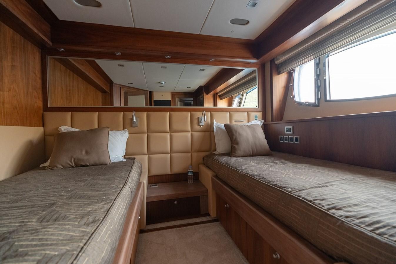 a room with two beds aboard ROUND MIDNIGHT Yacht for Sale