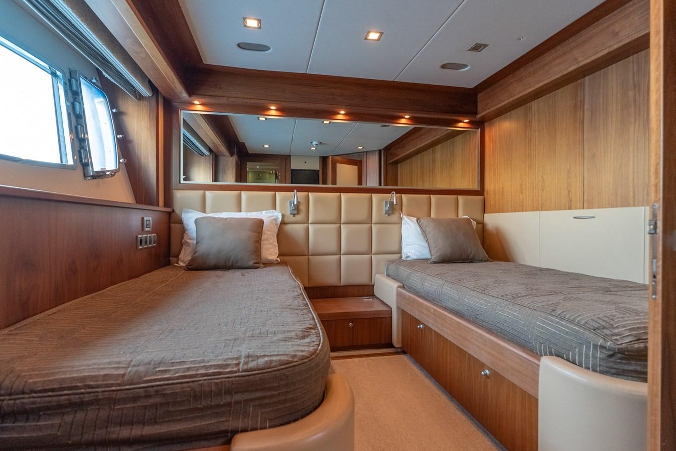 a room with two beds aboard ROUND MIDNIGHT Yacht for Sale