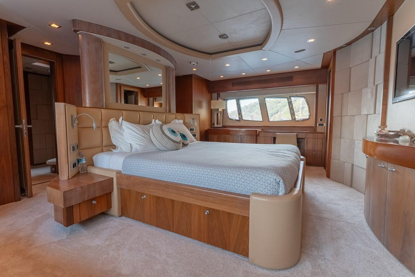 a bed in a room aboard ROUND MIDNIGHT Yacht for Sale