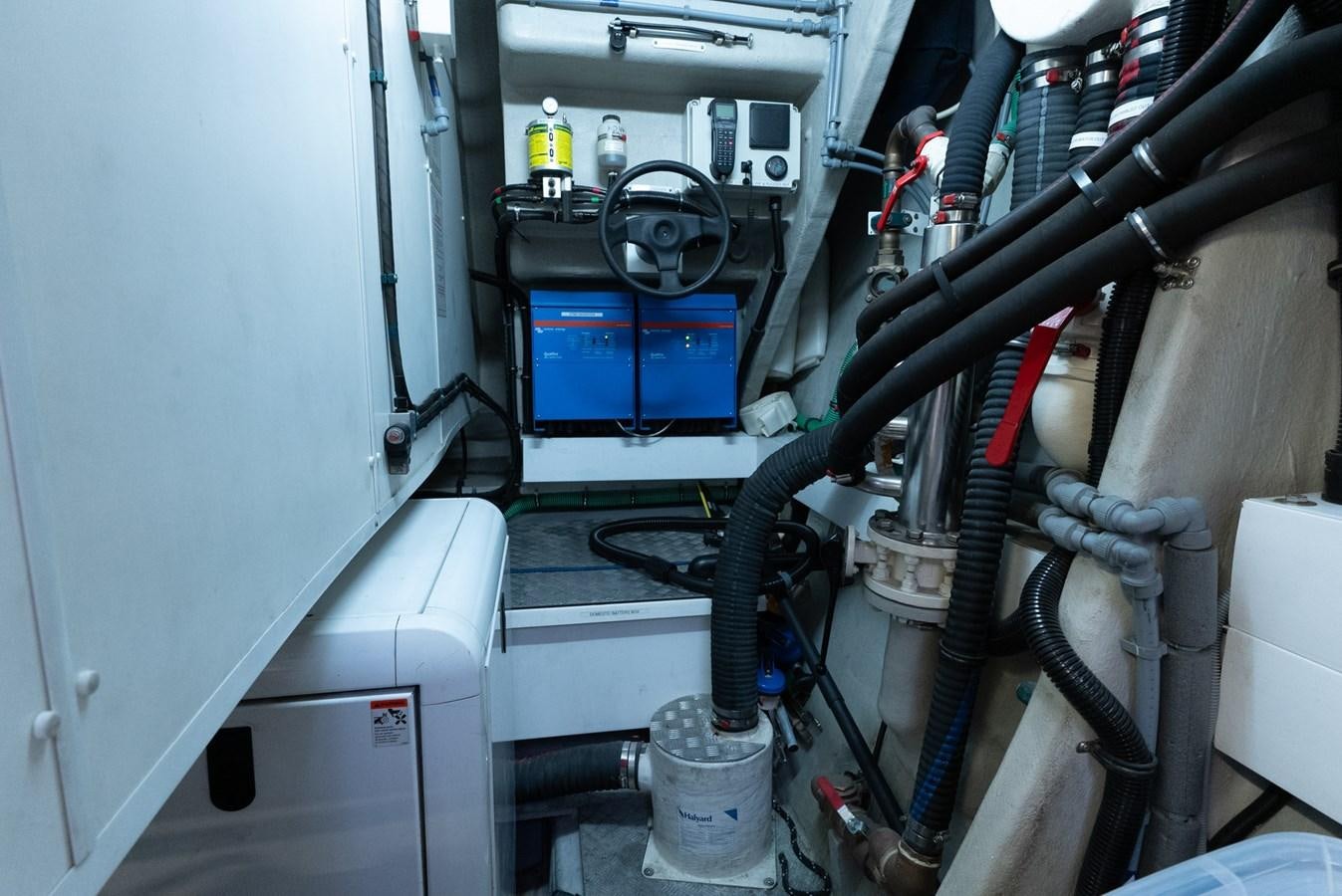 a machine with wires aboard ROUND MIDNIGHT Yacht for Sale