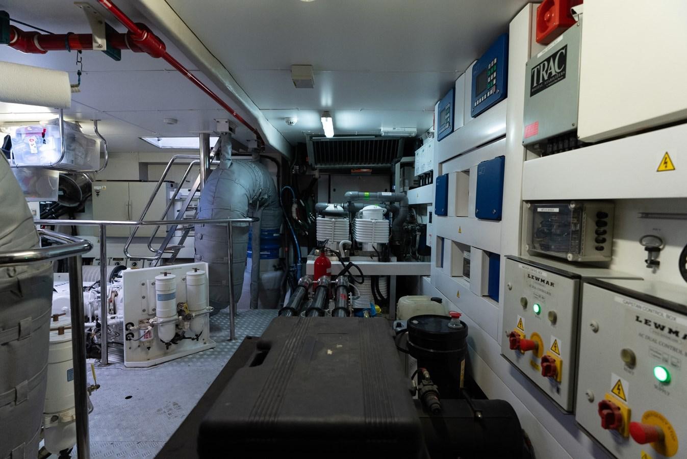 a room with machines and people aboard ROUND MIDNIGHT Yacht for Sale