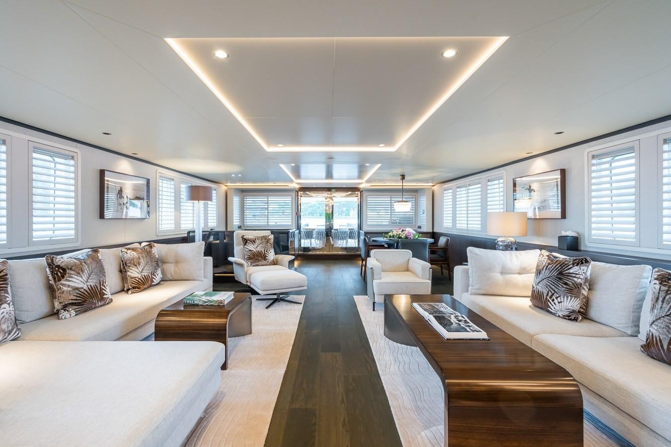 a living room with a large window aboard EMERALD Yacht for Sale