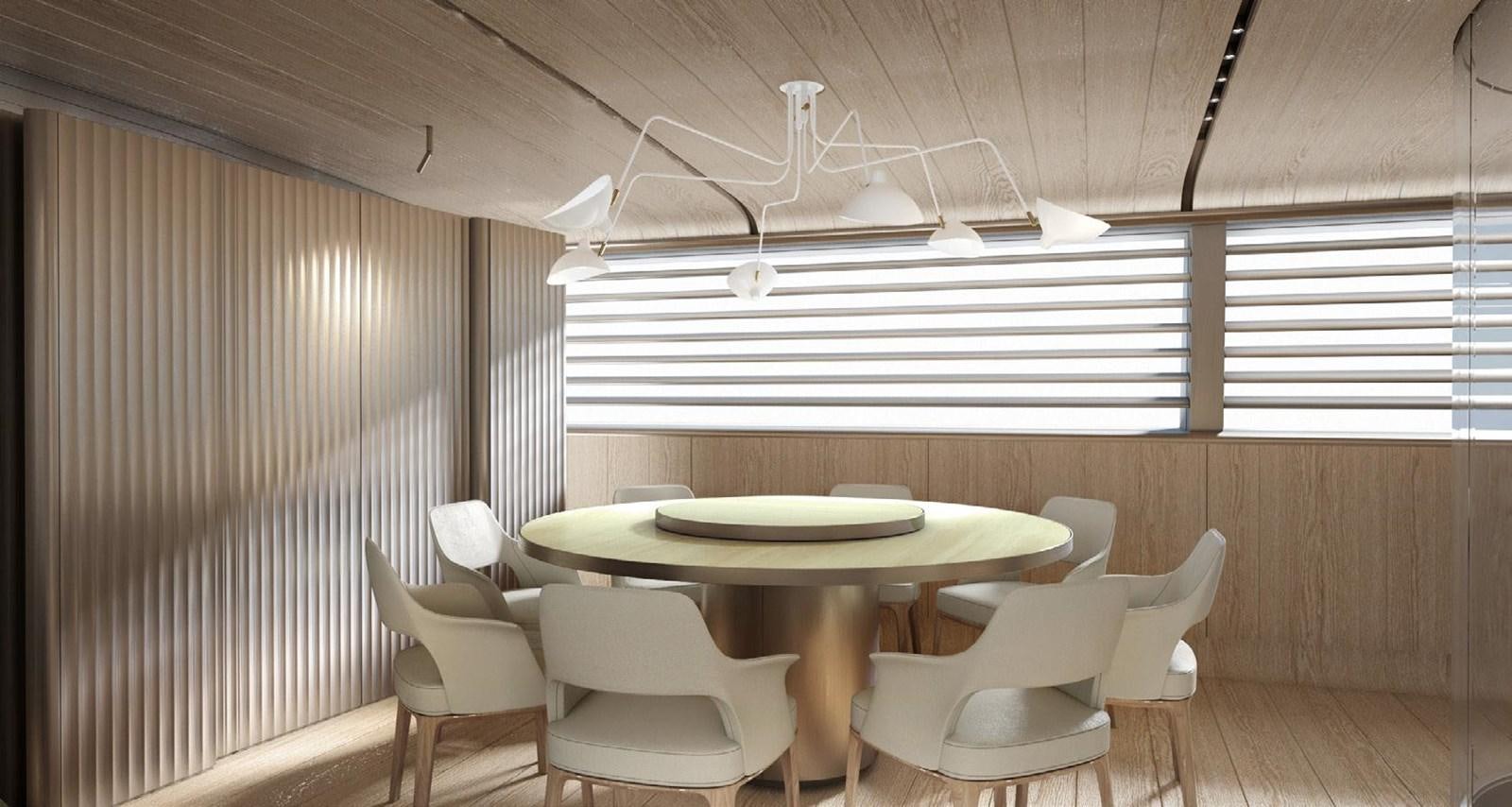 a room with a table and chairs aboard PERINI NAVI 47M SLOOP Yacht for Sale