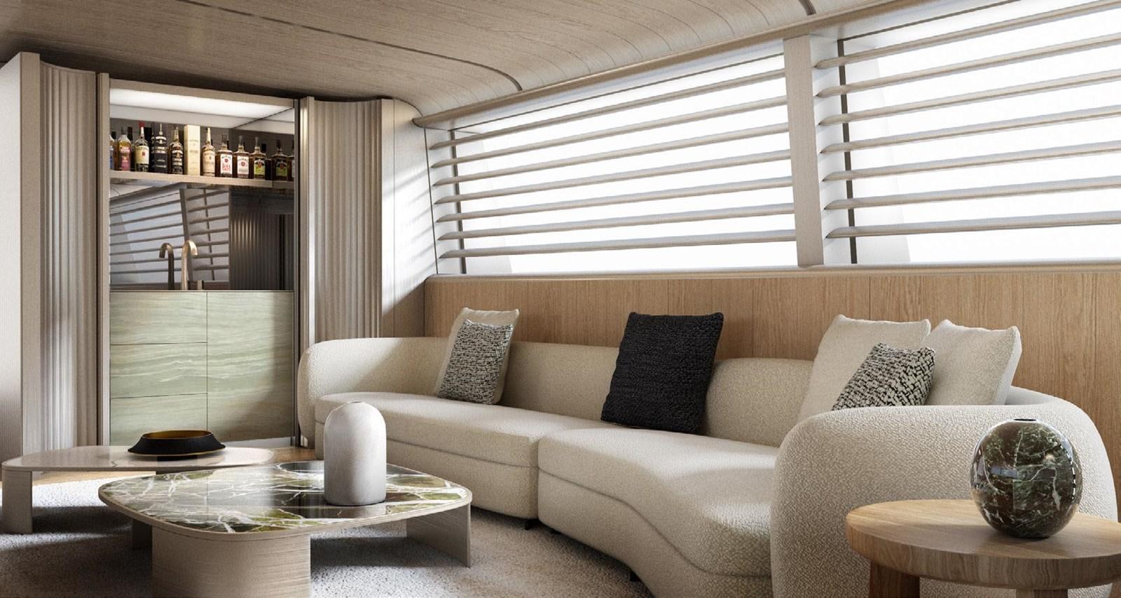 a living room with a couch and a coffee table aboard PERINI NAVI 47M SLOOP Yacht for Sale