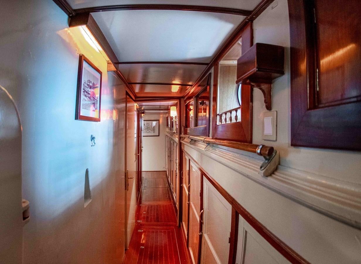 a hallway with several doors aboard FOREVER Yacht for Sale