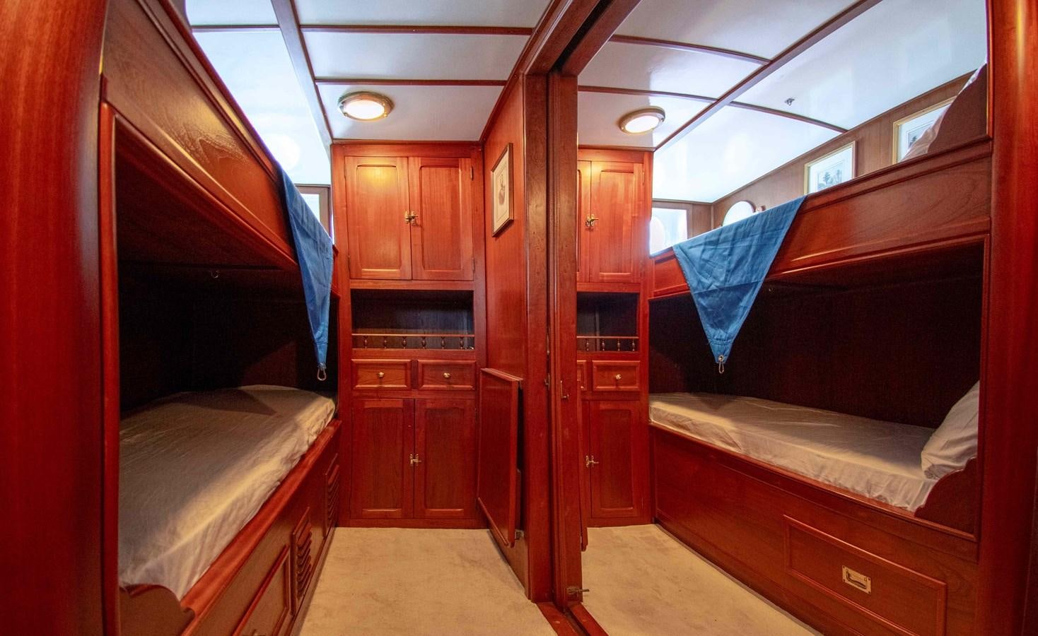 a room with bunk beds aboard FOREVER Yacht for Sale