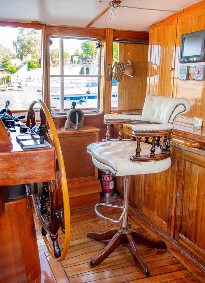 a kitchen with a sink and a table aboard FOREVER Yacht for Sale