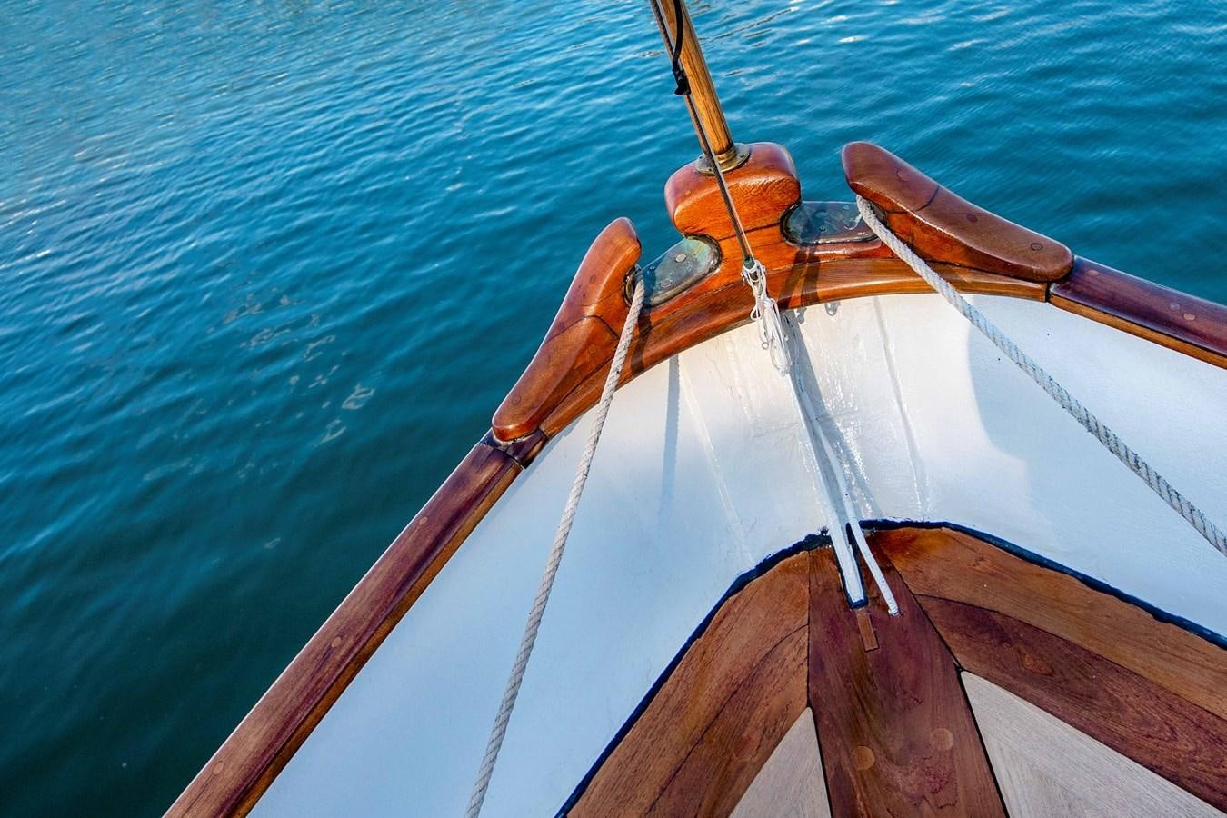 a wooden boat on the water aboard FOREVER Yacht for Sale