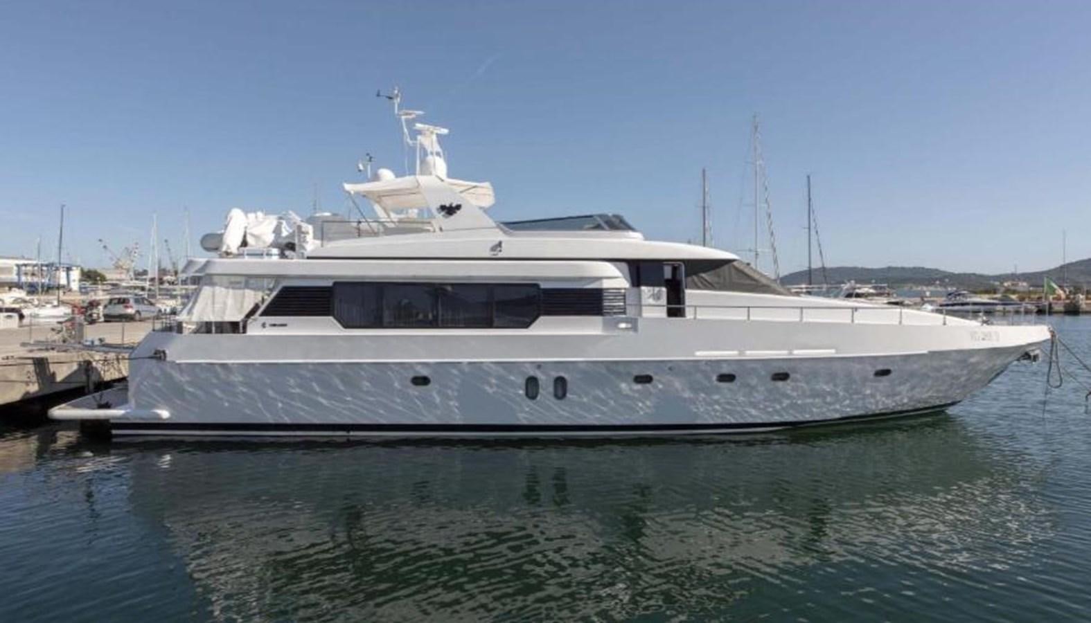 a boat docked at a pier aboard FALCO Yacht for Sale