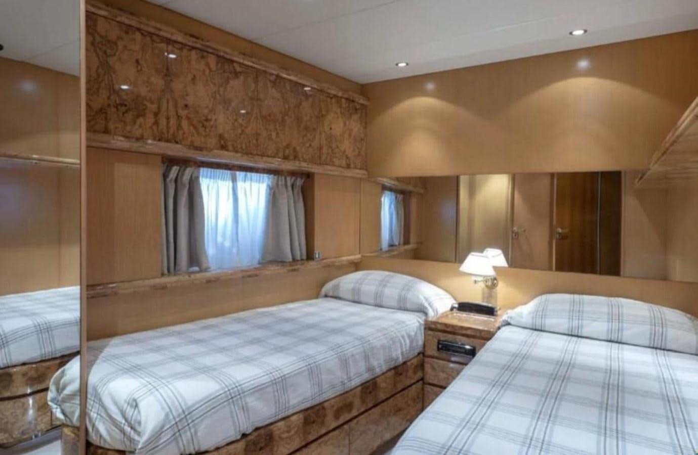 a couple of beds in a hotel room aboard FALCO Yacht for Sale