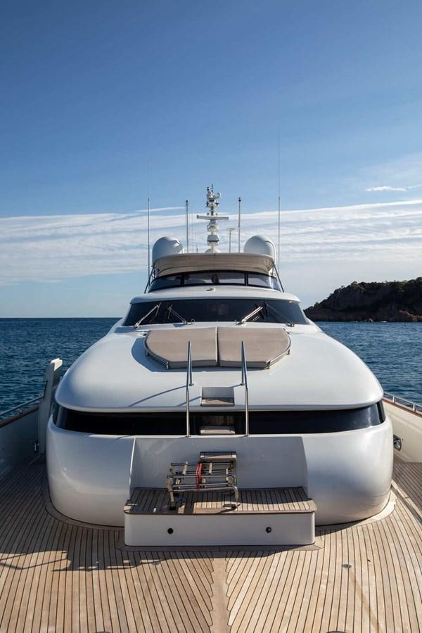 a white boat on a dock aboard BALANDRAU Yacht for Sale