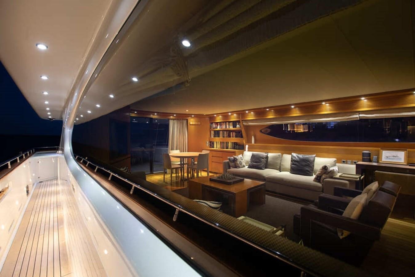 a large living room with a large pool table and couches aboard BALANDRAU Yacht for Sale
