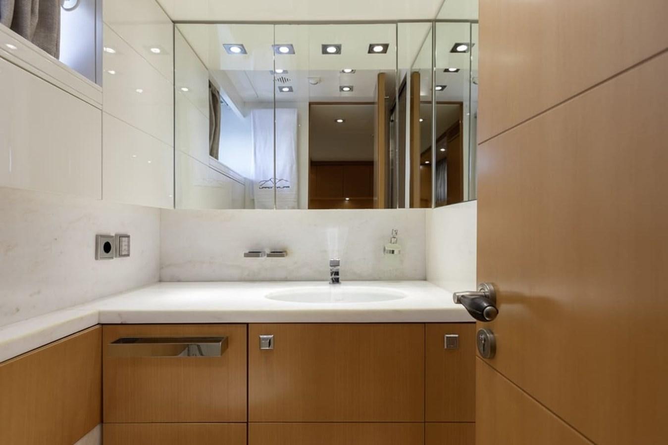 a bathroom with a large mirror aboard BALANDRAU Yacht for Sale