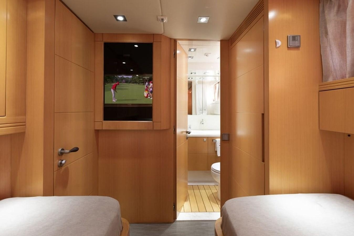 a bathroom with a bed and a mirror aboard BALANDRAU Yacht for Sale