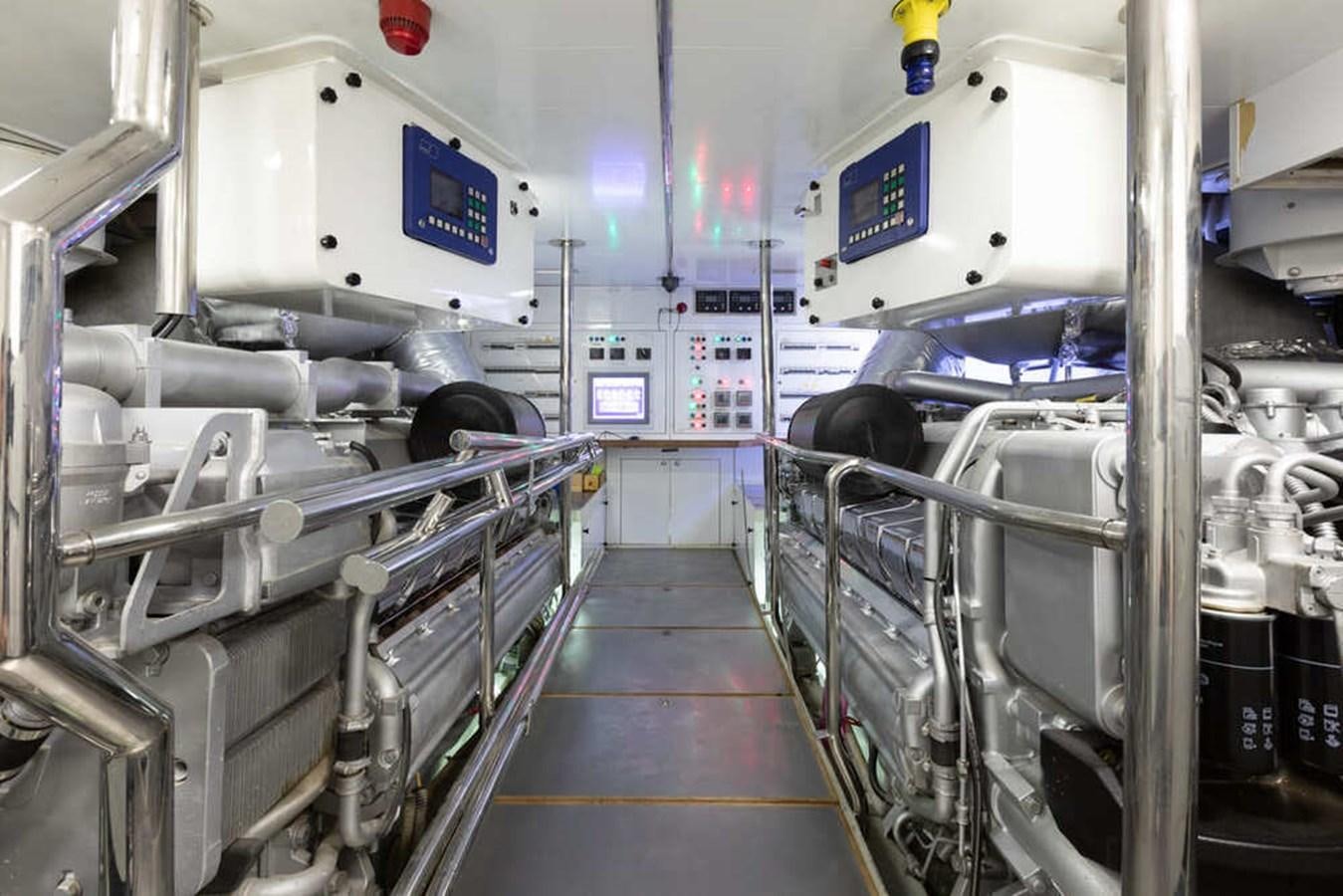 a person working in a factory aboard BALANDRAU Yacht for Sale