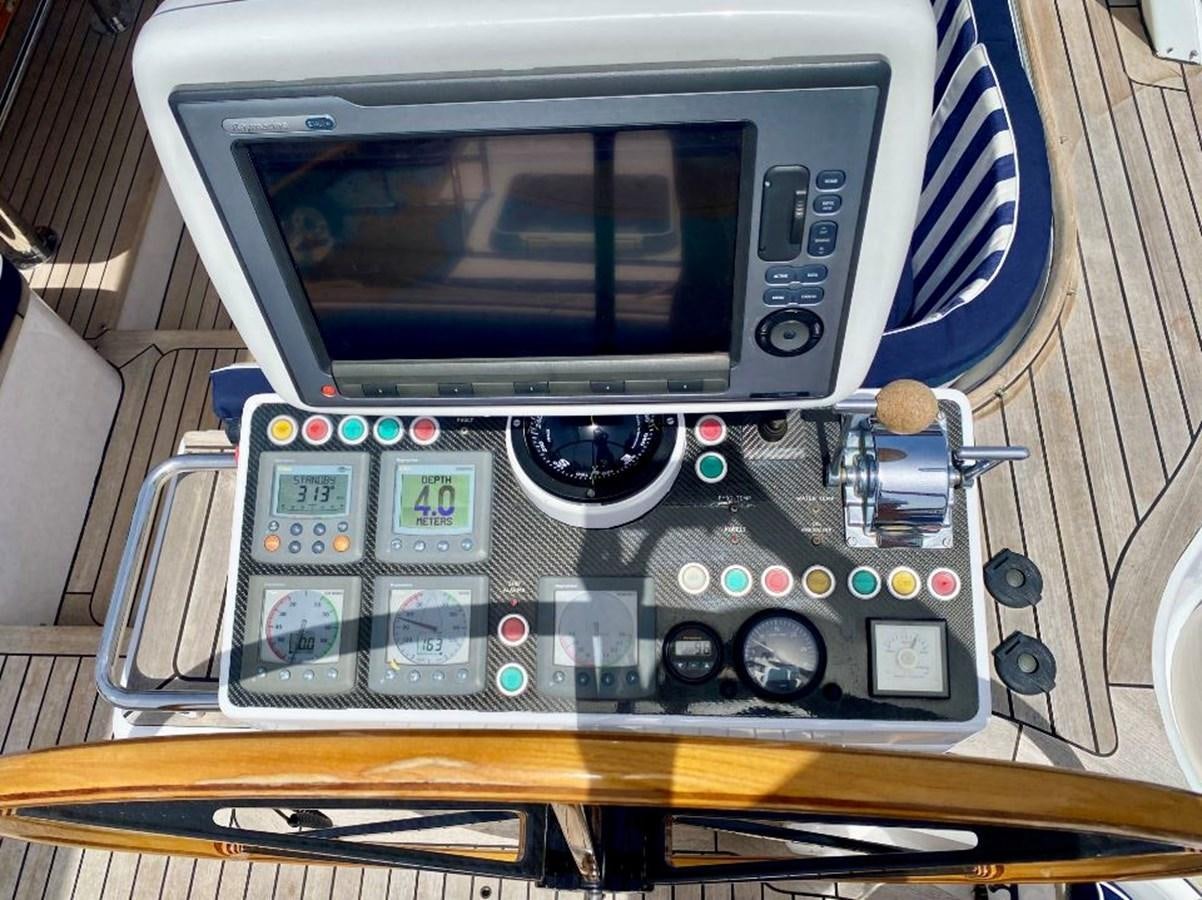 a computer with a screen and buttons aboard NIMROD Yacht for Sale