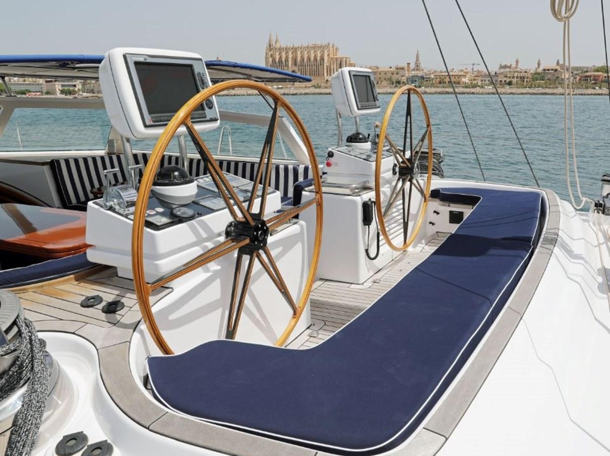 a boat with a steering wheel aboard NIMROD Yacht for Sale
