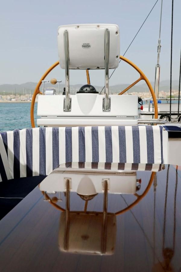 a boat with a large white machine on the front aboard NIMROD Yacht for Sale
