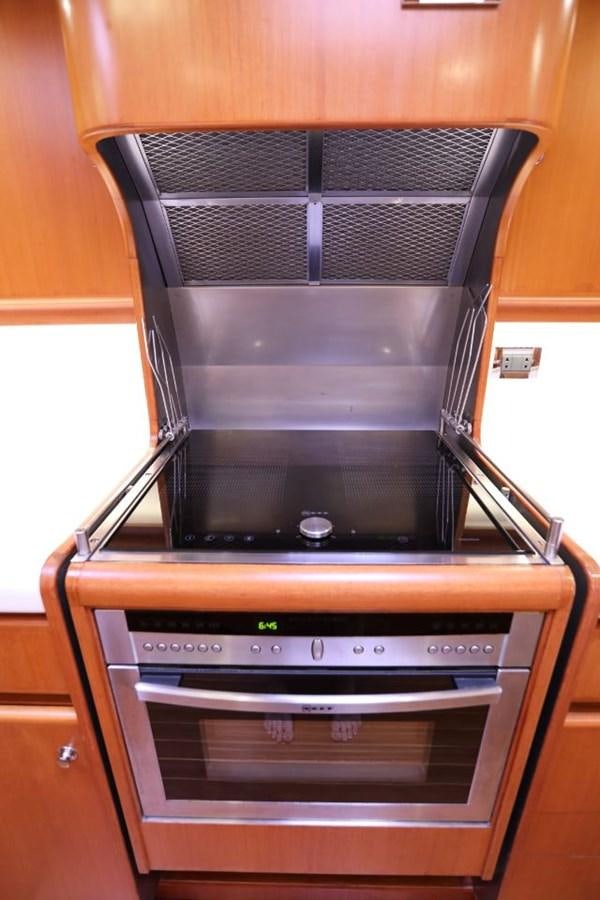 an oven with a light on the top aboard NIMROD Yacht for Sale