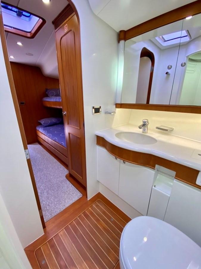 a bathroom with a sink and a toilet aboard NIMROD Yacht for Sale