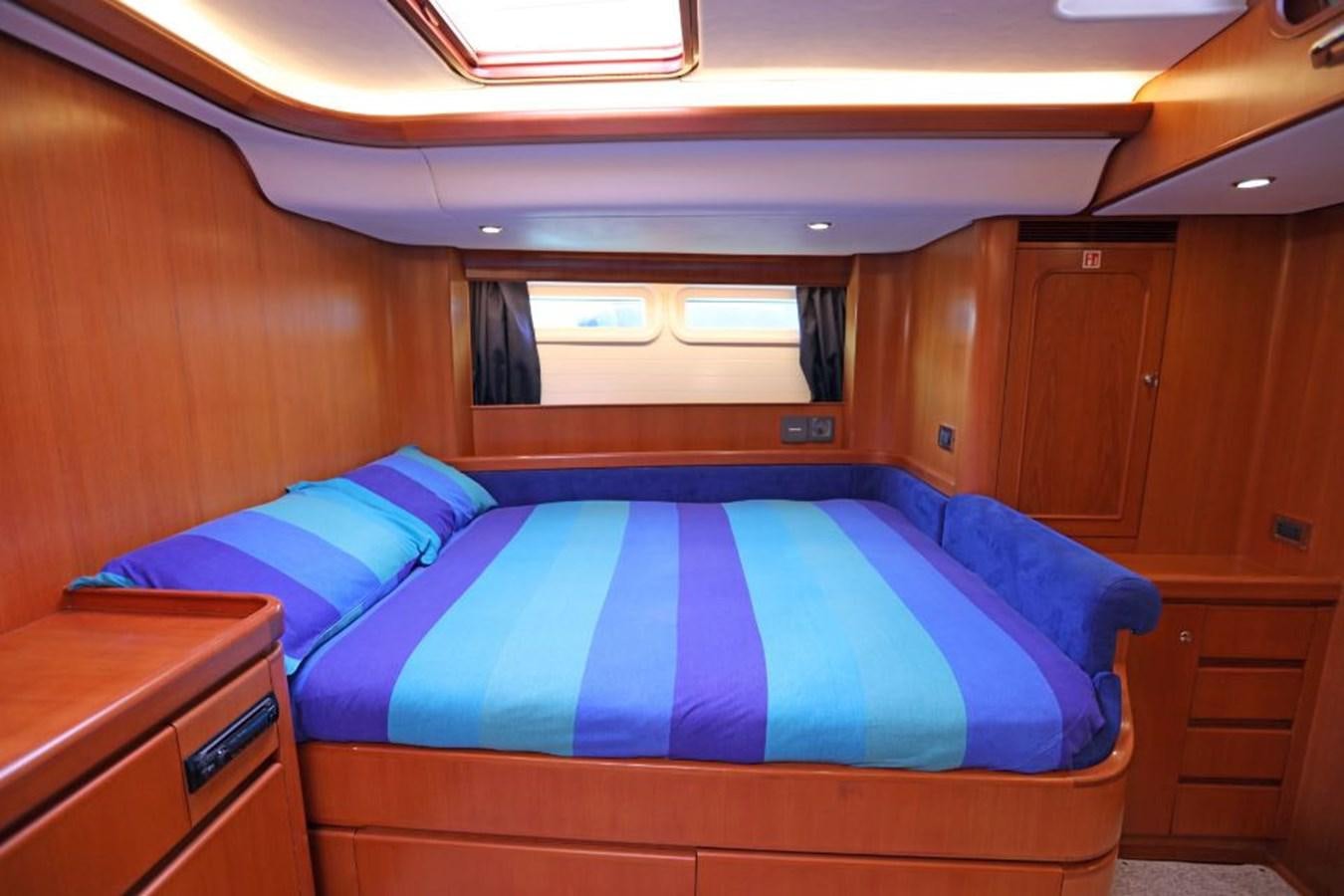 a bed in a cabin aboard NIMROD Yacht for Sale