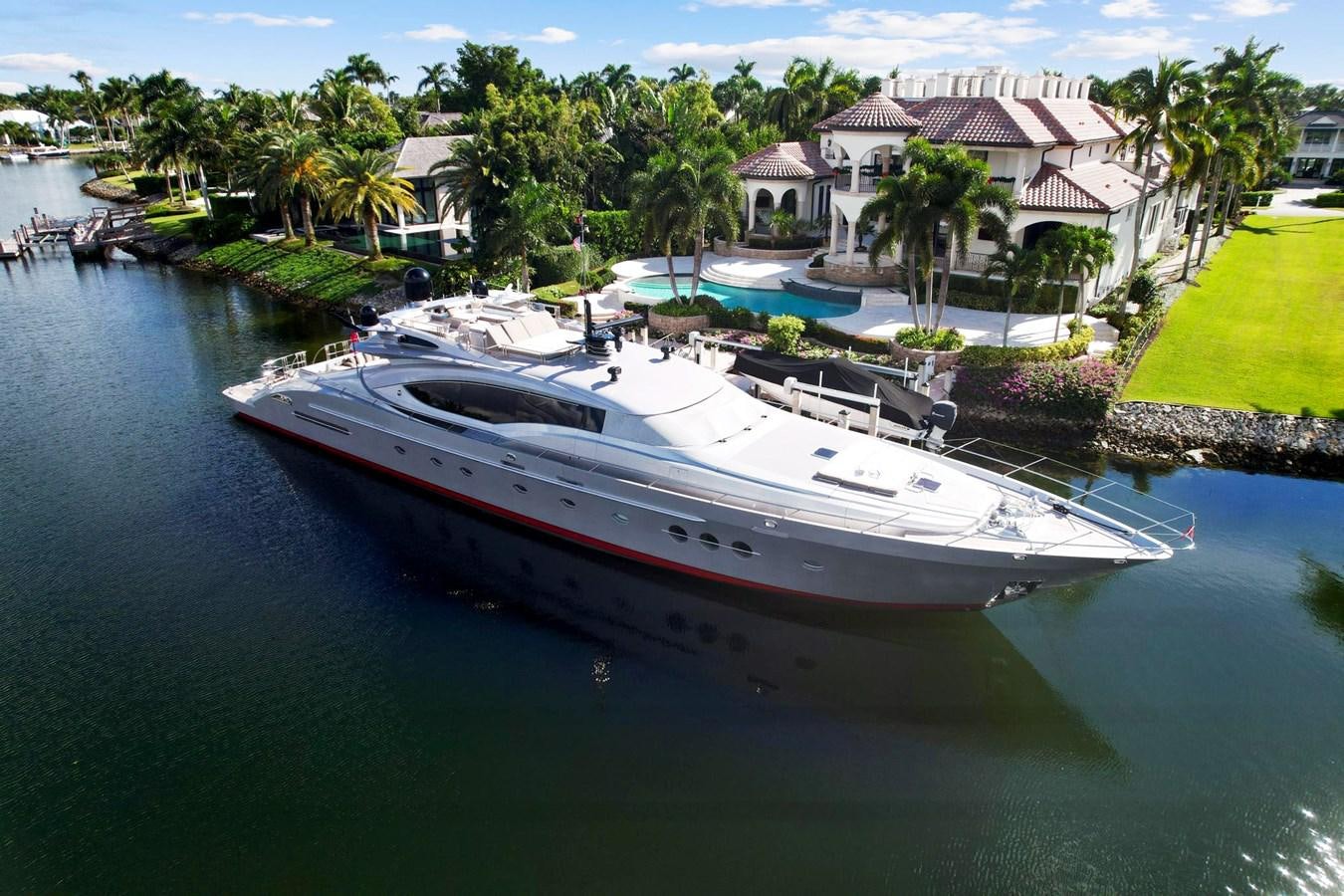 a white boat in a body of water aboard IZUMI Yacht for Sale
