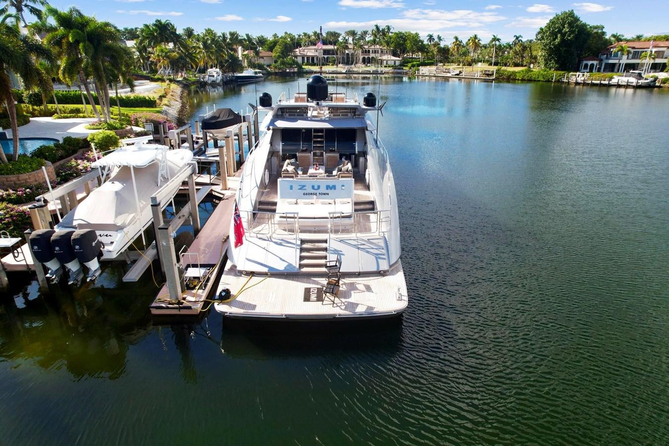 a boat docked at a pier aboard IZUMI Yacht for Sale