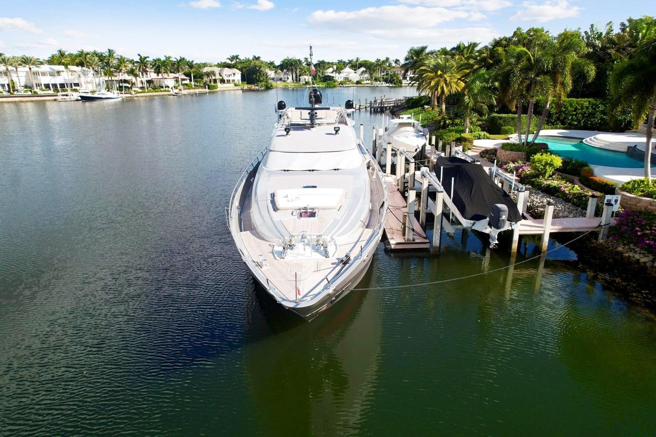 a boat tied to a dock aboard IZUMI Yacht for Sale