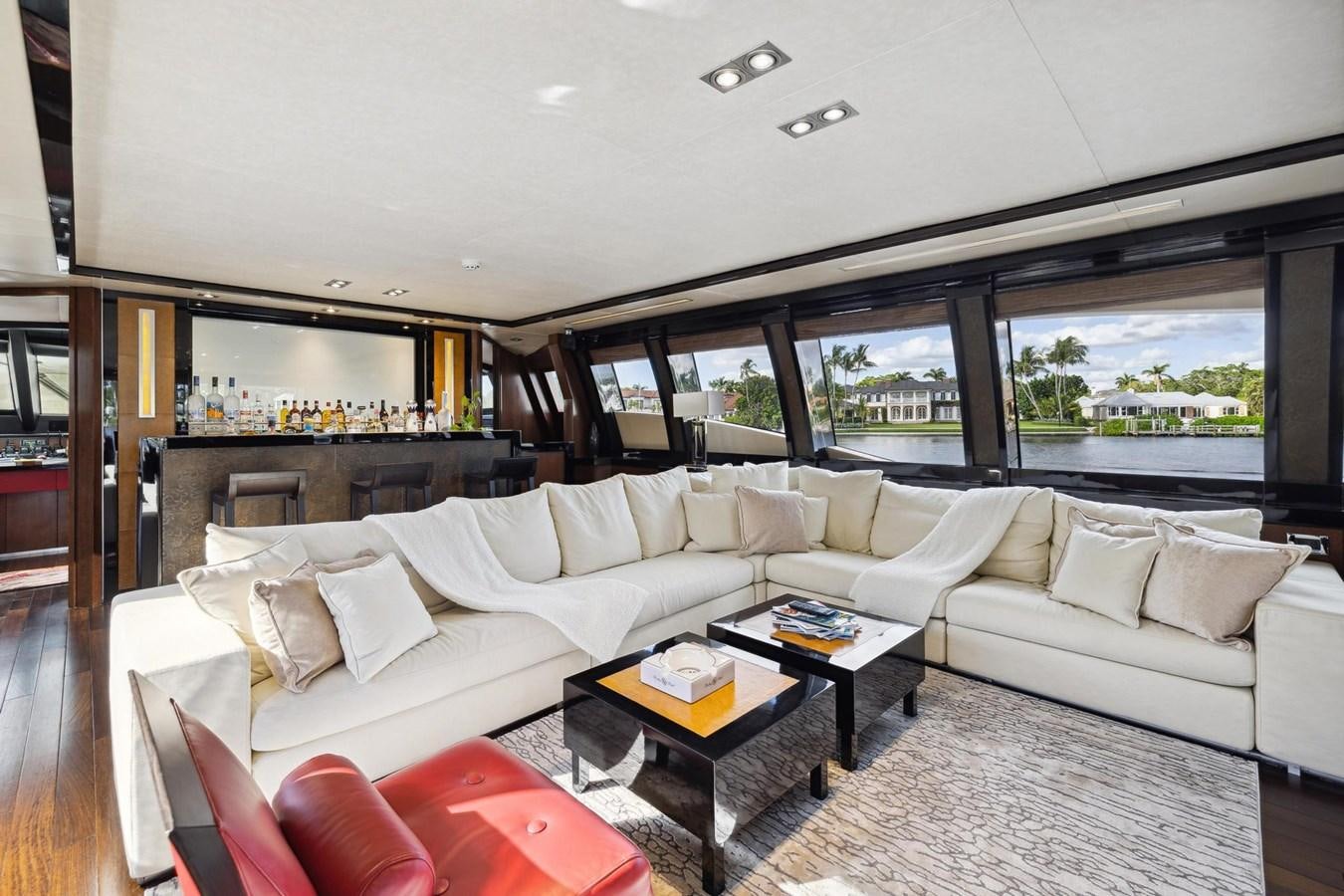 a living room with a large window aboard IZUMI Yacht for Sale