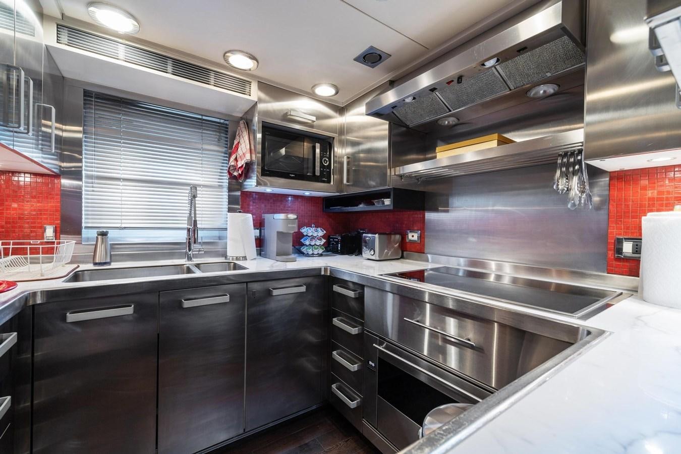 a kitchen with a large oven aboard IZUMI Yacht for Sale