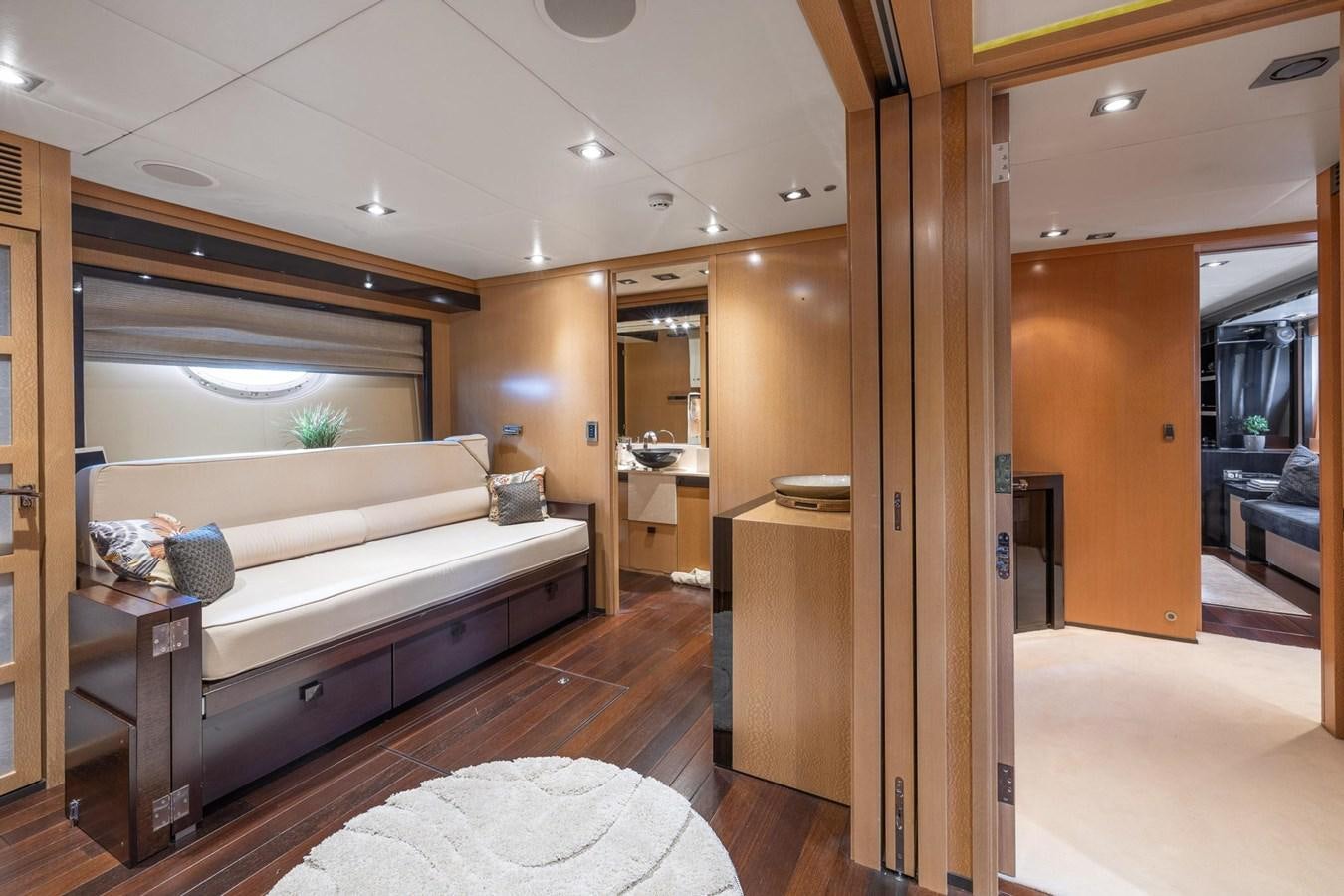 a bedroom with a bed aboard IZUMI Yacht for Sale